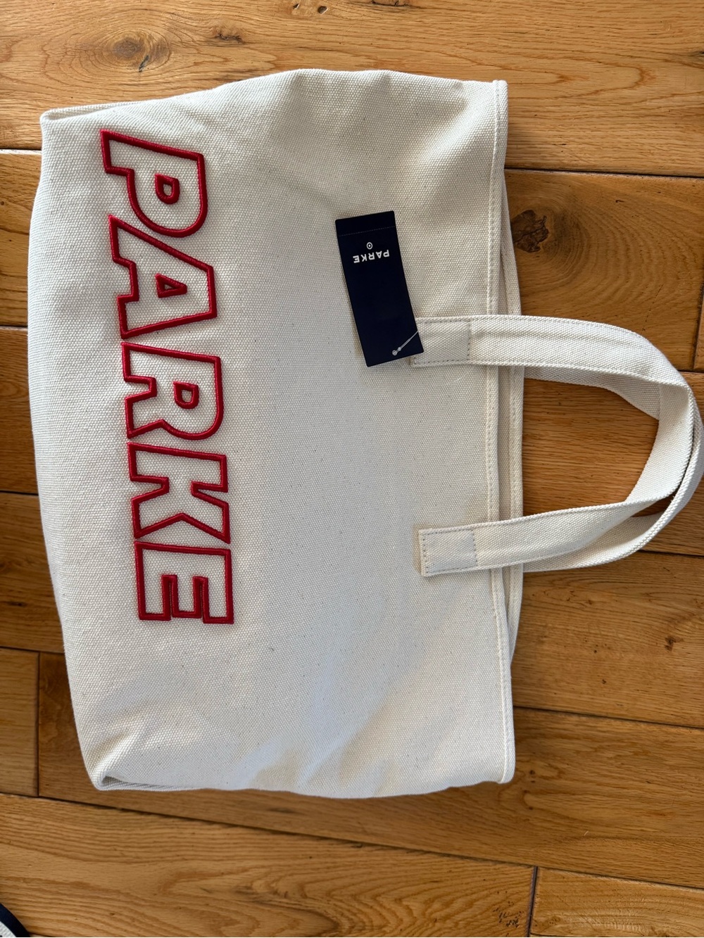 Parke Cream Canvas Tote with Red Logo Accent